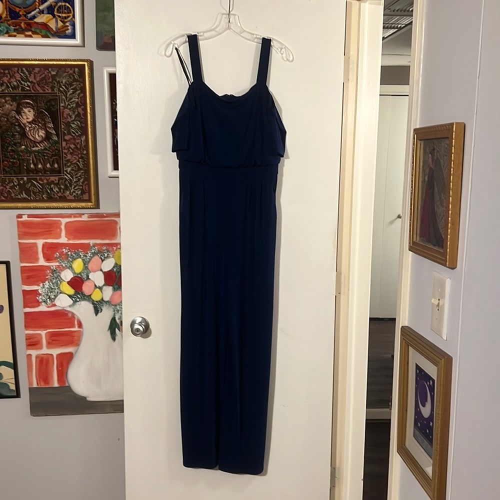 Vince Camuto blue jumpsuit. Peep shoulder. Back zip closure.